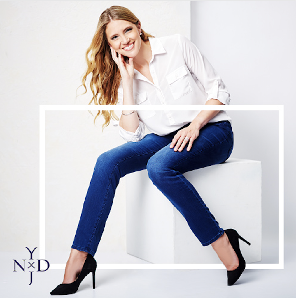 Bryan Carle THOB Original Editorial Women Clothing Bottoms Blue Jeans NYDJ White Button Up Long Sleeve Shirt Black Velvet Heels White Graphic Background White Cube On Figure Delightful Smile