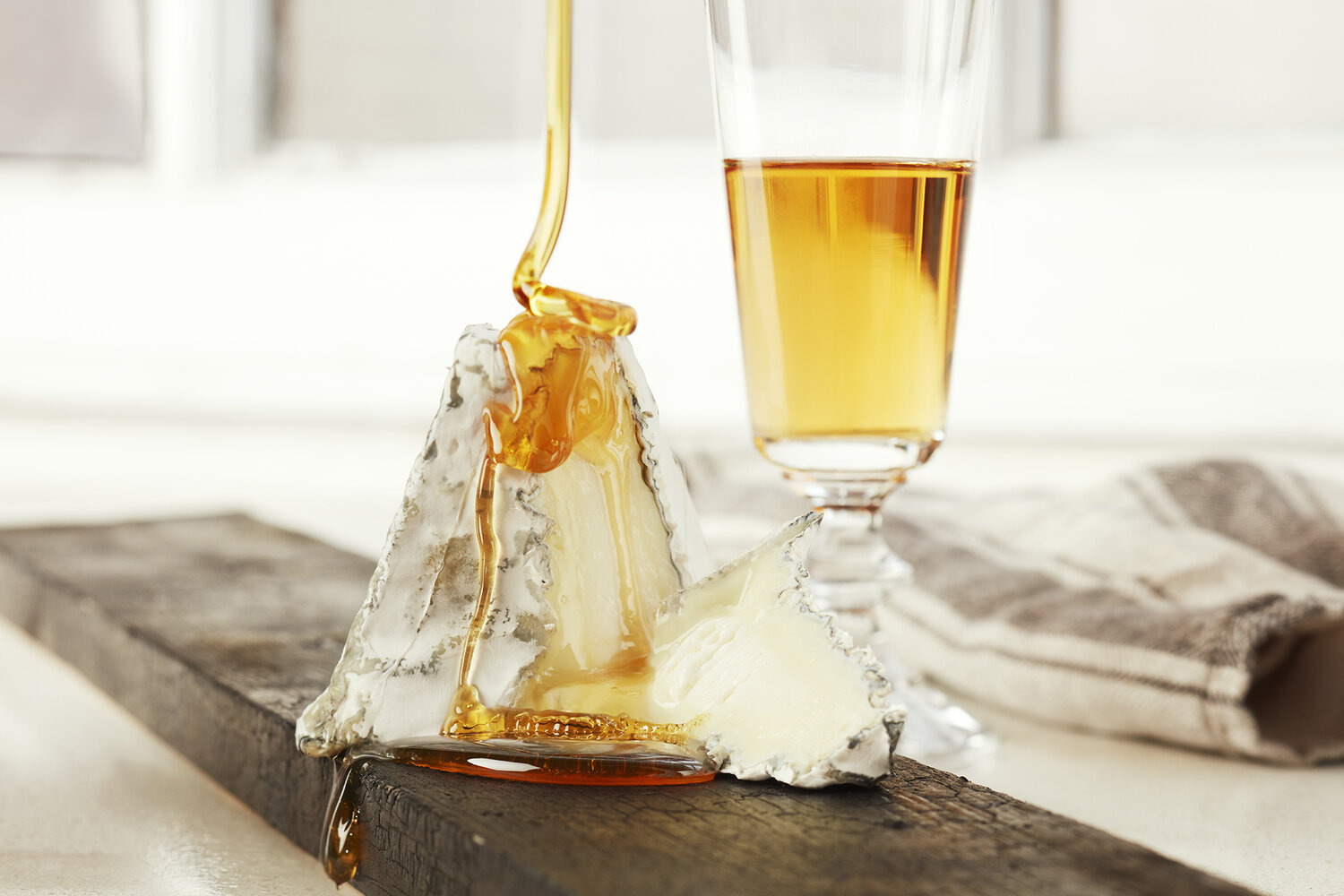 Bryan Carle THOB Original Editorial Baetje Farms Bloomsdale Goat Cheese Aged Award Winning Missouri Bloomsdale Honey Champagne Glass
